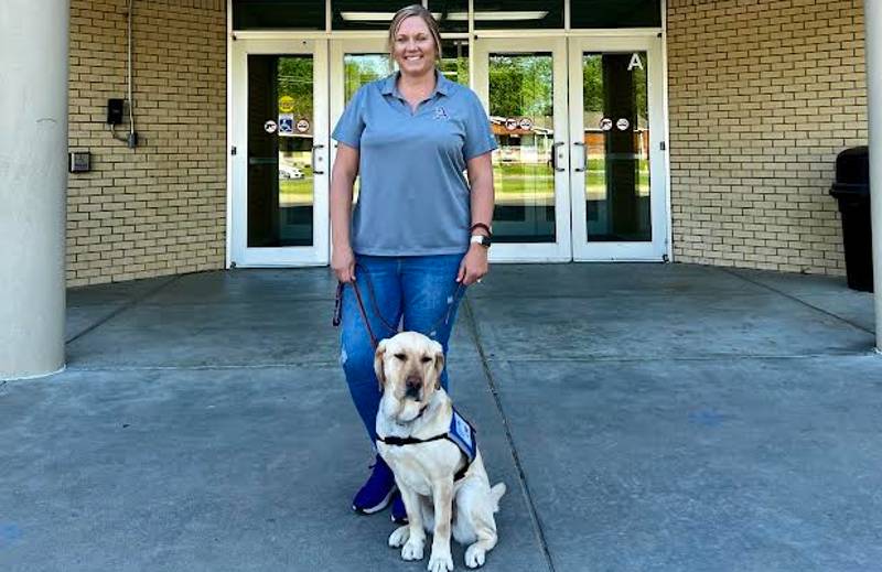 Cupid is taking aim at lifting spirits for students at Ark City Middle School; Woof.