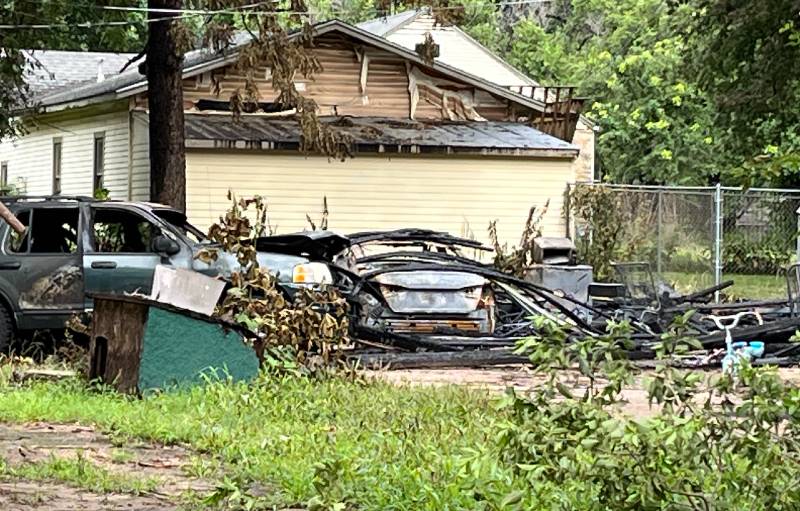 A fire on Saturday night destroys an Ark City garage and burns two vehicles