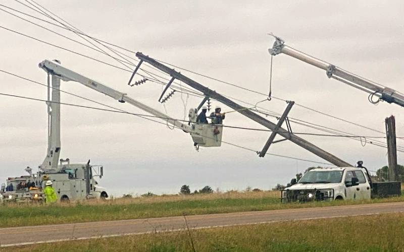 Storm wreaks havoc on power poles along Country Club Rd. west of Winfield