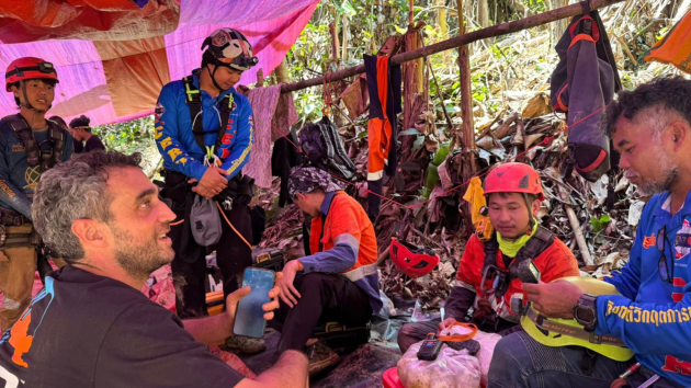 Rescuers suspend search for 2 miners believed trapped in flooded cave in Laos